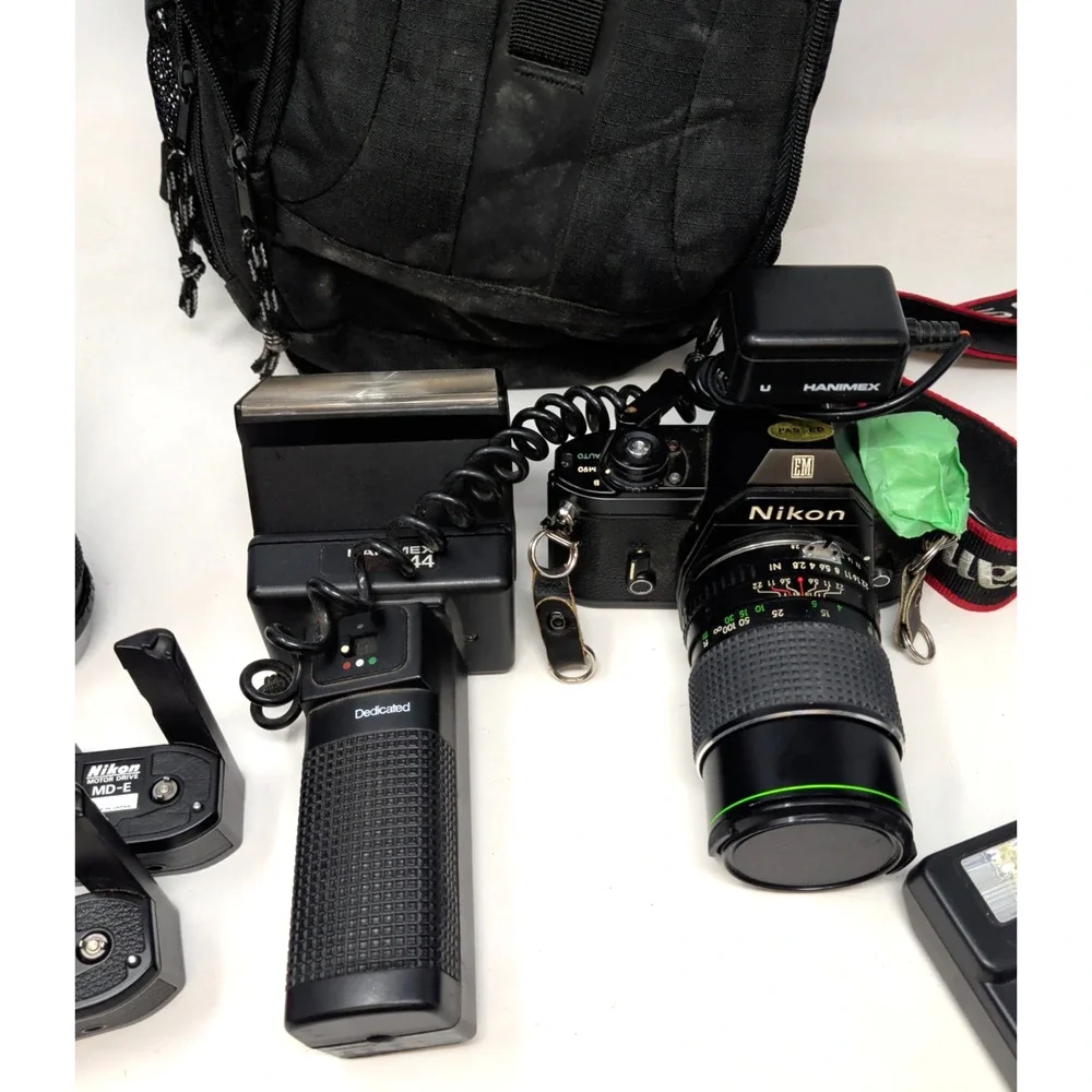 Nikon EM 35mm Film Camera w Lens Case & Accessories untested fast shipping